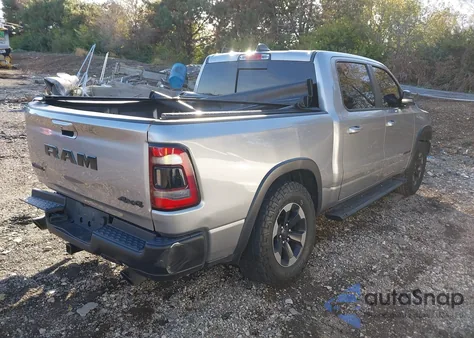 2020 Ram 1500 Rebel 4X4 5'7 Box from USA, damaged, VIN 1C6SRFLT0LN136084